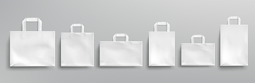 White paper eco bags different shapes. Vector realistic mockup of blank packets with handles isolated on gray . Template for corporate design on cardboard bag for store or market