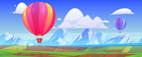 Hot air balloons fly above mountain landscape with green meadows and fields in valley. Vector cartoon illustration with flying colorful airships with baskets in sky, snow peaks and grassland