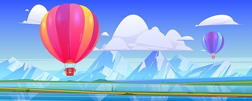 Hot air balloons fly above mountain landscape with lake and green meadows in valley. Vector cartoon illustration with flying colorful airships with baskets in sky, snow peaks, river and grassland