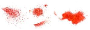 Scatters of red pepper powder. Vector realistic illustration of ground paprika and chili pepper seasoning. Splashes of hot dried spice isolated on white 