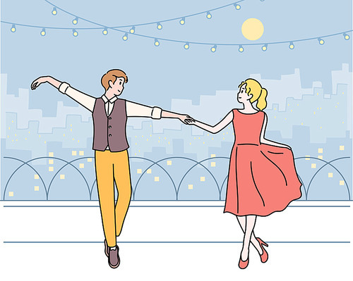 남녀가 달빛이 있는 옥상에서 함께 춤을 추고 있다.