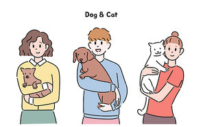 사람들이 개와 고양이를 품에 안고 있다.