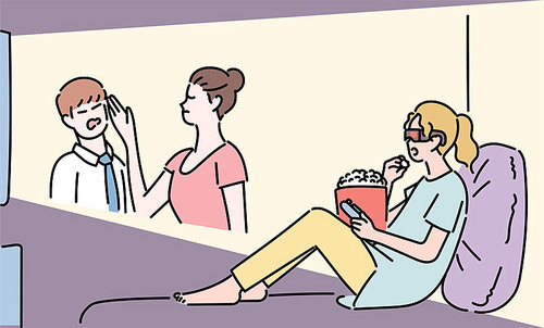 한 여성이 입체안경을 쓰고 영화를 시청하고 있다.