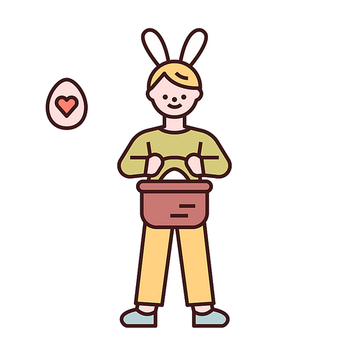 토끼 머리띠를한 소년이 계란 바구니를 들고 서있다.