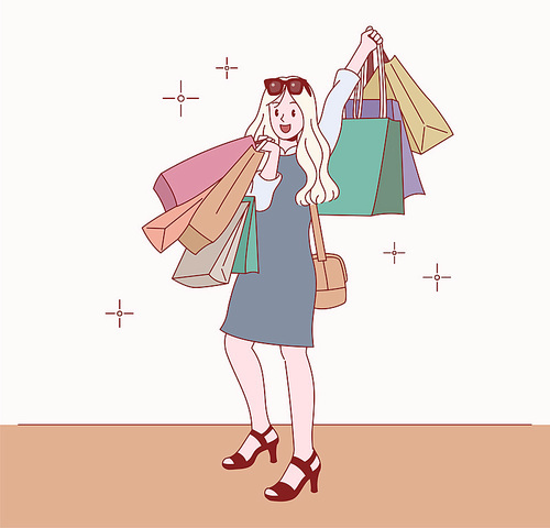 한 소녀가 쇼핑백을 잔뜩 들고 즐거워 하고 있다.