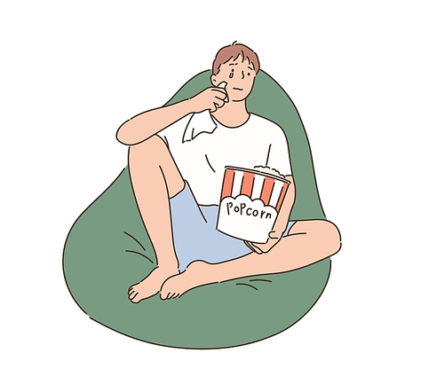 한 남자가 빈백에 앉아 팝콘을 먹으며 티비를 보고 있다. 손그림 스타일 일러스트레이션.