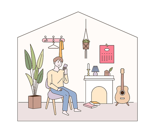 모던한 거실 인테리어. 한 남성이 벽난로가 있는 거실에 앉아있다.  심플한 벡터 스타일의 일러스트레이션.