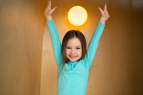 Cute happy child expressing positive emotions stock photo
