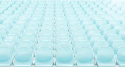 Light  blue rows of seats on the stadium .