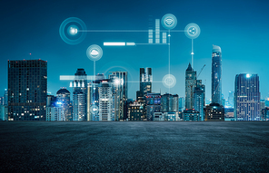 Modern city and empty asphalt floor with smart 5G wireless communication network concept .
