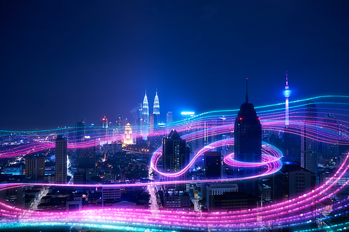 Night city and abstract with gradient blue and red glowing light trail surround the city ,Smart city big data connection technology concept .
