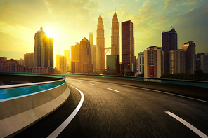 Highway overpass motion blur with city background .