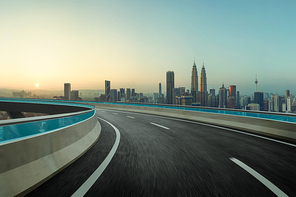 Highway overpass motion blur with city background .