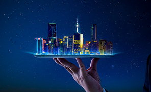 Waiter hand holding an empty digital tablet with smart cityscape  .
