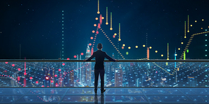 Businessman standing on modern transparent glass balcony watching city night view with global business charts and graphs design. Business ambition and vision concept .