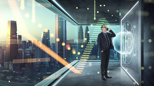 Businessman in suit working with virtual 3d holographic interface screens . Futuristic business, technology, internet and social networking  technology concept .