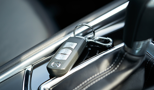 Car keys put in car inside. Auto car dealership concept.