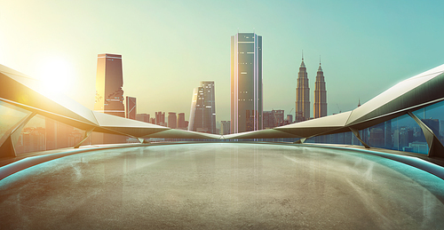 Panoramic view of futuristic geometric shapes design empty floor with Kuala Lumpur city skyline . Sunrise scene .