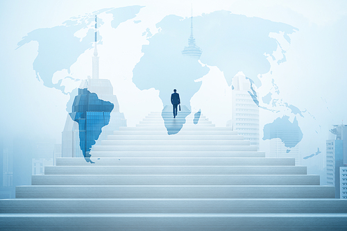 Ambitions concept with businessman climbing stairs with global map blending effect .