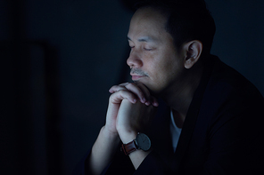 Asian business man praying