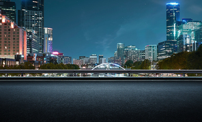 Melbourne urban cityscape skyline night scene with empty asphalt floor on front