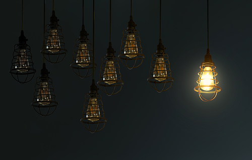 Hanging compose retro light bulb decor glowing in gray background .