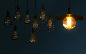 Hanging compose retro light bulb decor glowing in gray background .