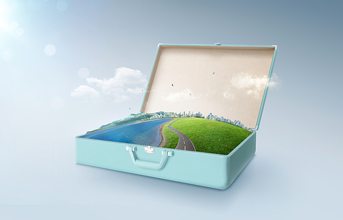 City skyline, green field, lake, mountain and curvy asphalt highway  in an open retro vintage suitcase isolated on light blue background .