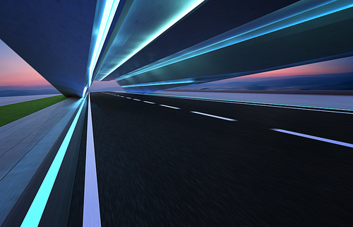 Abstract motion blur effect fast forward moving asphalt tunnel road .