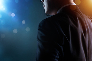 Closeup business man with bokeh and light flare effect apply .