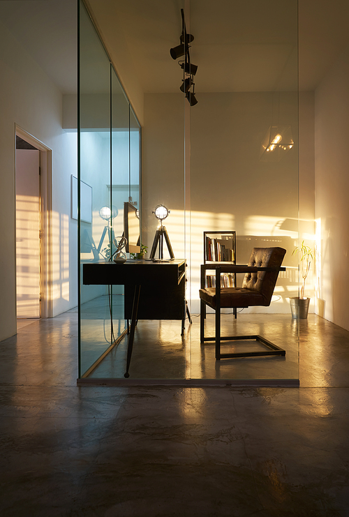 Soho office interior with sunset golden hour lighting and shadow , loft style interior design