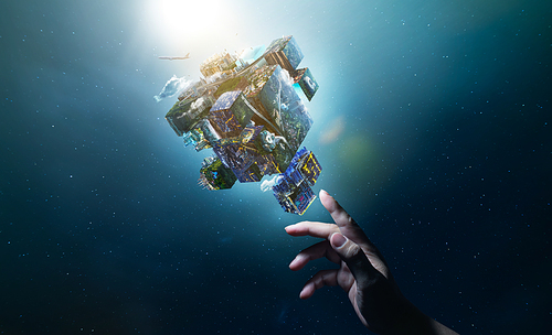 Hand of touching an digital Earth planet puzzle cube  , smart global technologies concept . Mixed media