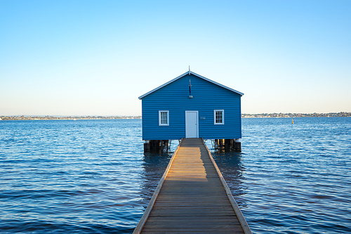 Sunset over the Matilda Bay boathouse in the Swan River in Perth, Western Australia.