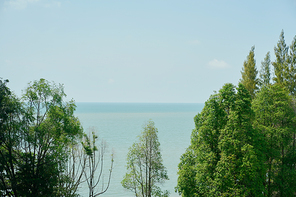 Green and blue sea in tropical Pangkor island . Beautiful travel destination for summer vacation.