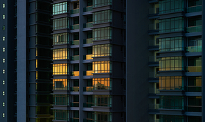 Modern apartment buildings on evening . Facade of a modern apartment building .