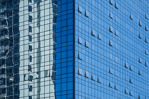 Closeup glass facade of office skyscraper building