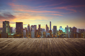 Bangkok urban cityscape golden hour with empty wooden floor on front