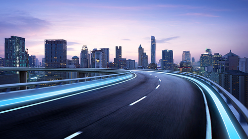 Curvy flyover highway moving forward road with Bangkok cityscape evening scene view . motion blur effect apply