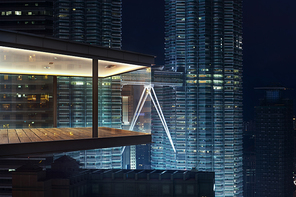 Modern sky office by night with beautiful city skyline view .