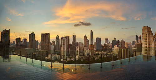 Bangkok beautiful twilight sunset view with skyscraper in business district in Bangkok Thailand. Panorama wide angle view .