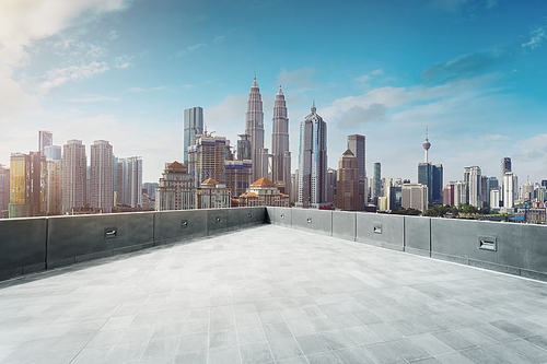 Open apace rooftop with Kuala Lumpur cityscape skyline view  .