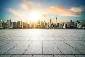 Cityscape with empty brick floor ,sunset sunrise scene .