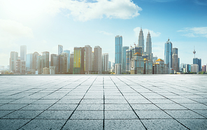 Perspective  empty marble floor in front of  city skyline background .