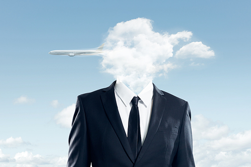 The head of the businessman is covered with clouds , and the plane flew over the clouds ,business concept .