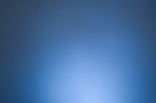 Light blue round gradient background .