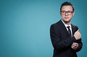 Portrait of motivated asian businessman