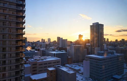 Aerial sunrise view of cityscape of winter Sapporo, Hokkaido, Japan