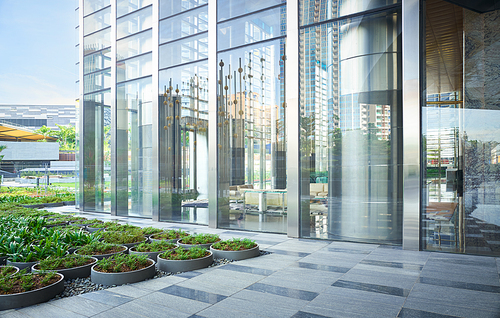 Modern building exterior with cityscape background