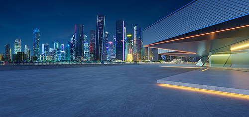 Panoramic view of a futuristic city skyline with vibrant lights during blue hour. 3D render