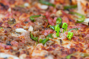 Scientists inspecting giant pizza. Unhealthy food concept. Macro photography